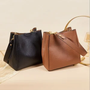 Clara frontbackground handbag shoulderbag crossbody balck7goldenbrown 1174x